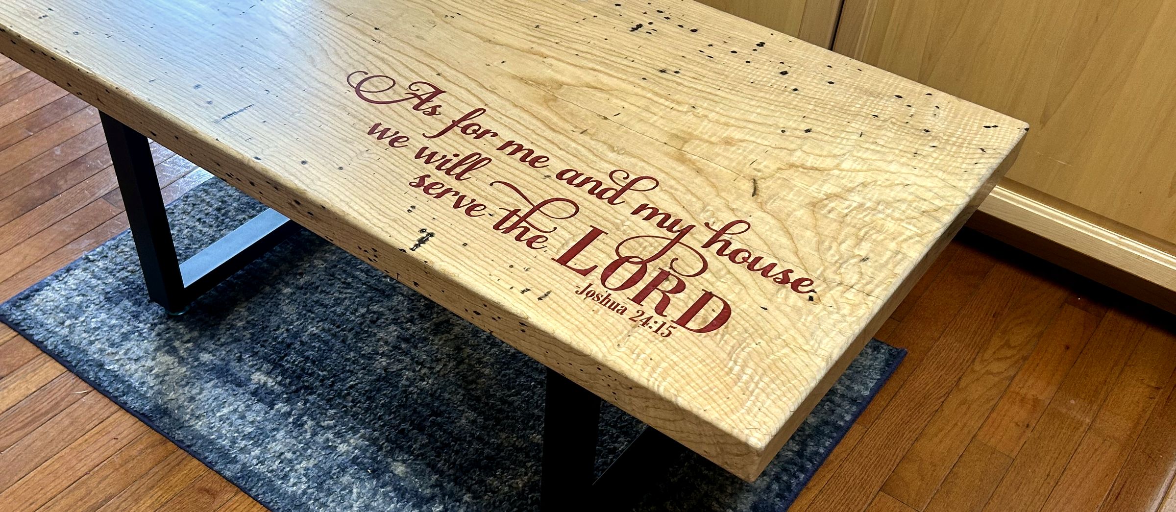 Ambrosia maple coffee table with Joshua 24:15 carved and filled in red